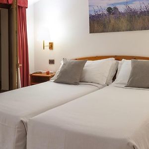 Kamer met een Queen Size Bed